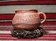 Anasazi / Jeditto black on orange mug ca. 1375 ad