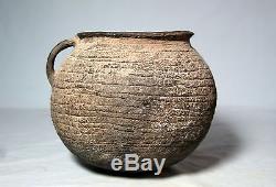 Anasazi intact corrugated olla/pitcher with handle ca. 1100 ad No Restoration