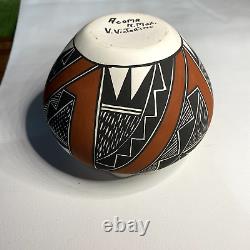 Native American Acoma Pottery vessel with fluted lid signed V. Victorino