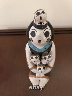 Native American Pottery Storyteller doll signed D. Sando Jemez