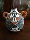 Native American pottery signed