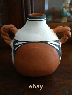 Native American pottery signed