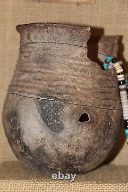Prehistoric Native American Artifacts (Stone Axe, Pot, Sandle, Pottery Sharde.)