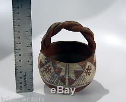 Rare Isleta Pueblo Indian Polychrome Pottery bowl with twist handle, c1930 4.75