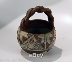 Rare Isleta Pueblo Indian Polychrome Pottery bowl with twist handle, c1930 4.75